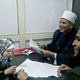 Al-Azhar clerics answers a womans' question inside a Fatwa Kiosk, at the Al Shohada'a metro station, in Cairo, Egypt, Tuesday, July 25, 2017. Al-Azhar, the Sunni Muslim world's foremost religious institution, has set up booths in Cairo metro stations to provide religious edicts to commuters in the latest bid to dispel religious misconceptions seen as fostering Islamic militancy in the country, which is targeting mainly security personnel and Christians.
